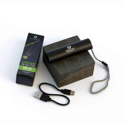 Ecodor EcoLight oplaadbare UV‑urinedetector opgesteld op tafel